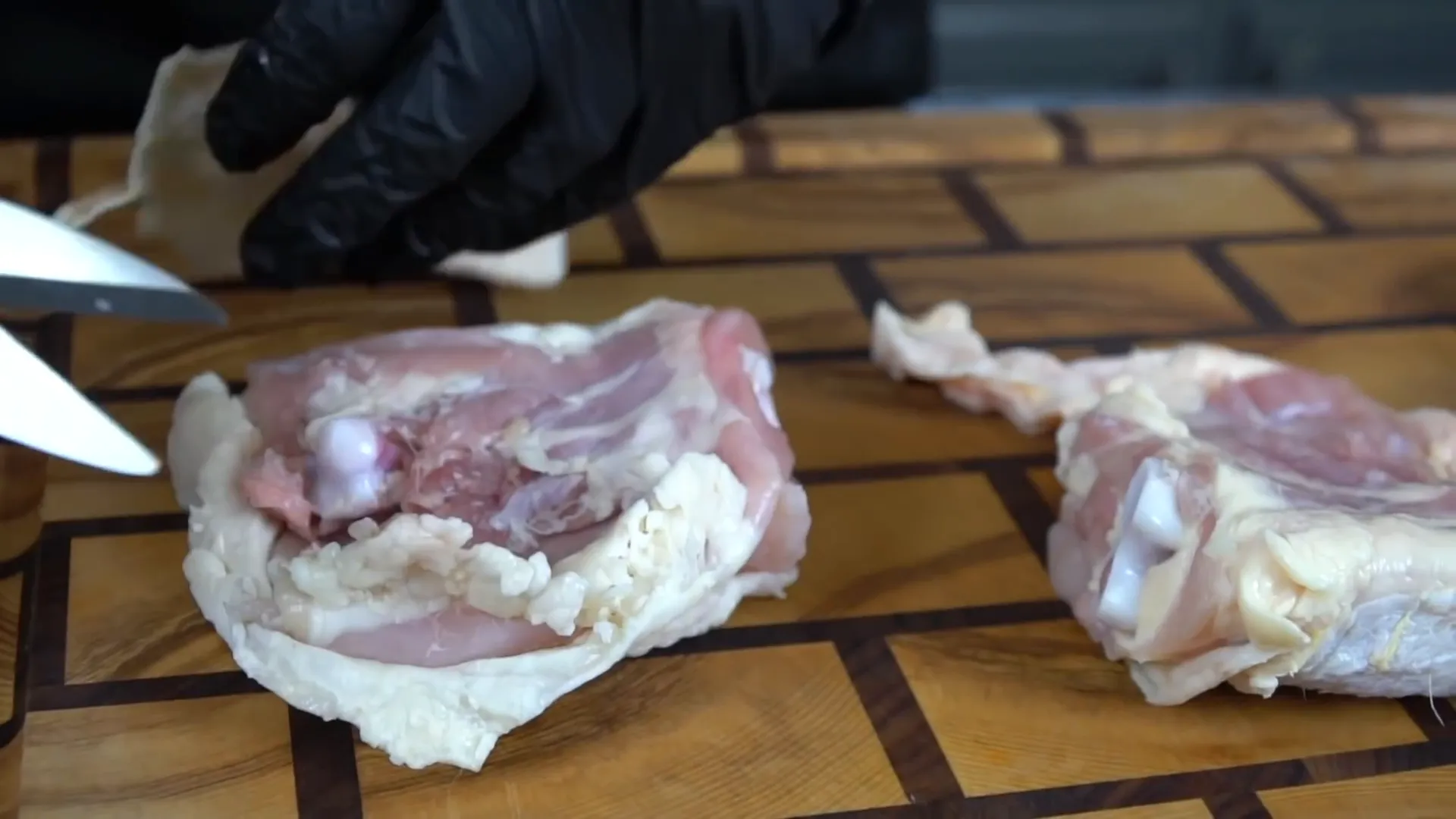 Trimming chicken thighs