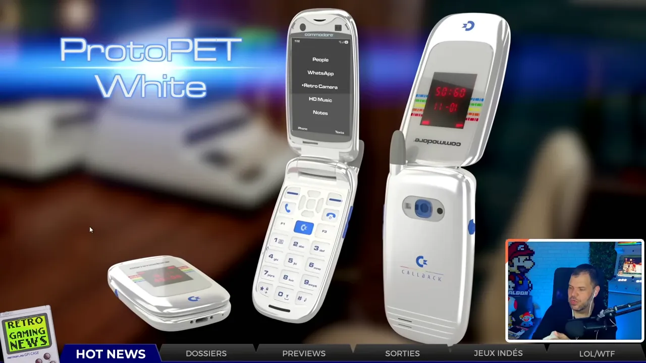 Plusieurs téléphones à clapet Commodore Callback posés sur une table avec accessoires