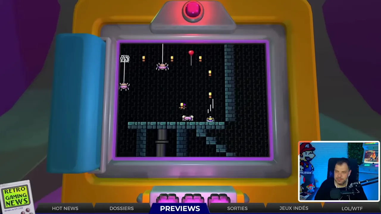 Écran de jeu montrant un niveau coloré avec interface de mini écran et puzzle en plateforme