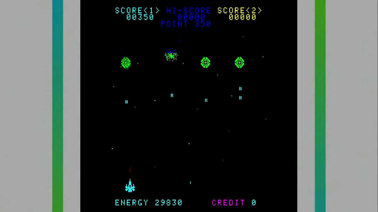 Écran de jeu d Ozma Wars avec ennemis colorés sur fond noir