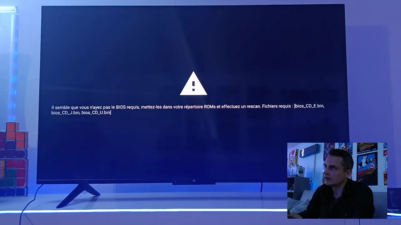 Écran noir affichant un symbole d’avertissement et un message d’erreur
