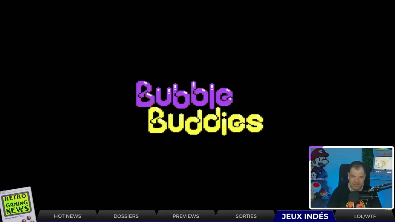 Écran titre 'Bubble Buddies' en pixel art sur fond noir, avec petit encart webcam de l'animateur en bas à droite