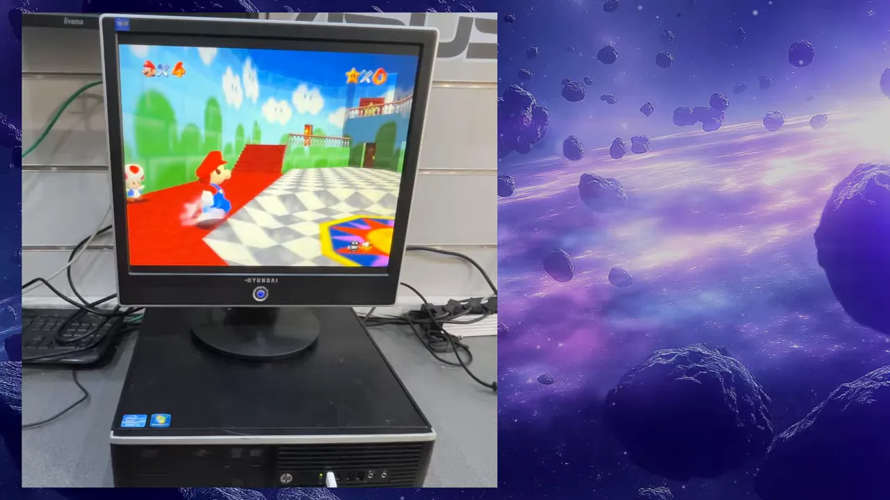 Super Mario 64 affiché sur le moniteur posé sur le PC HP
