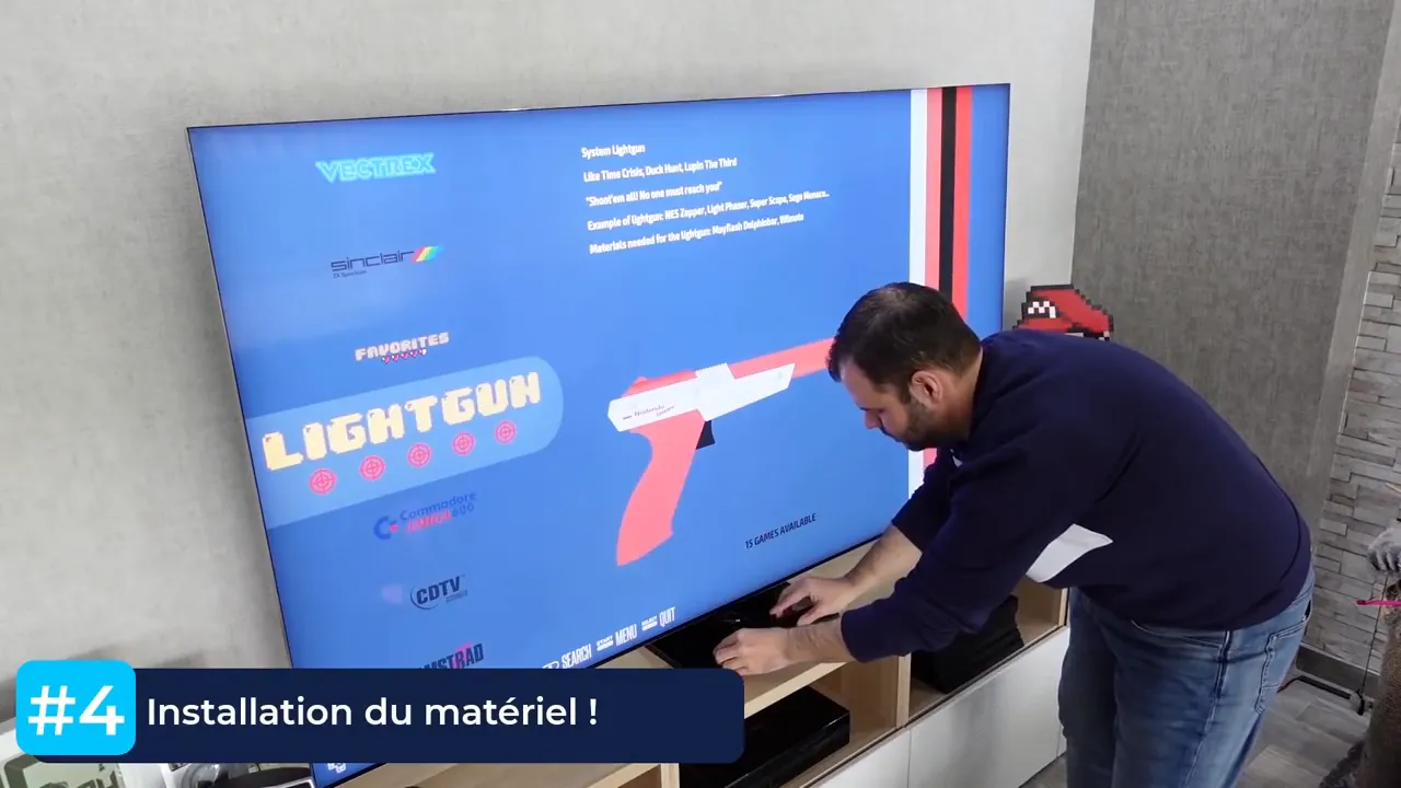 Capture vidéo montrant un utilisateur en train de placer la DolphinBar sous le téléviseur pour Lightguns Recalbox
