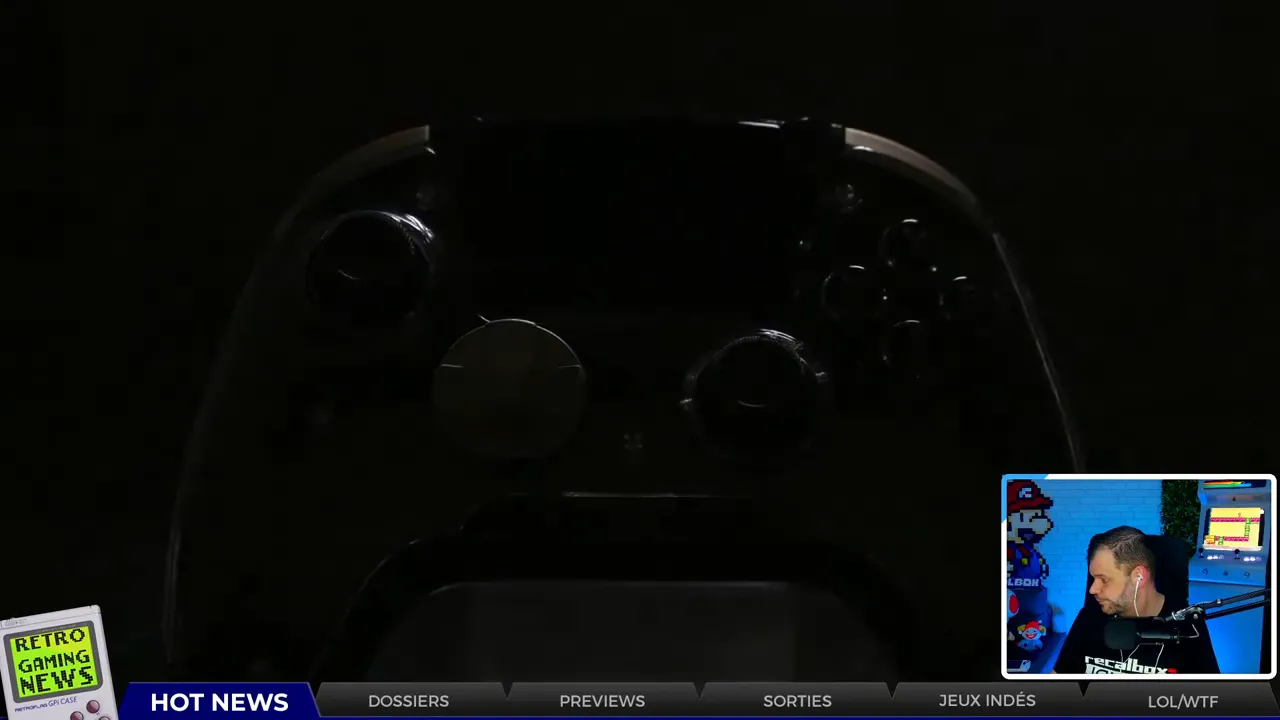 Silhouette frontale d'une manette Anbernic avec encart du stream