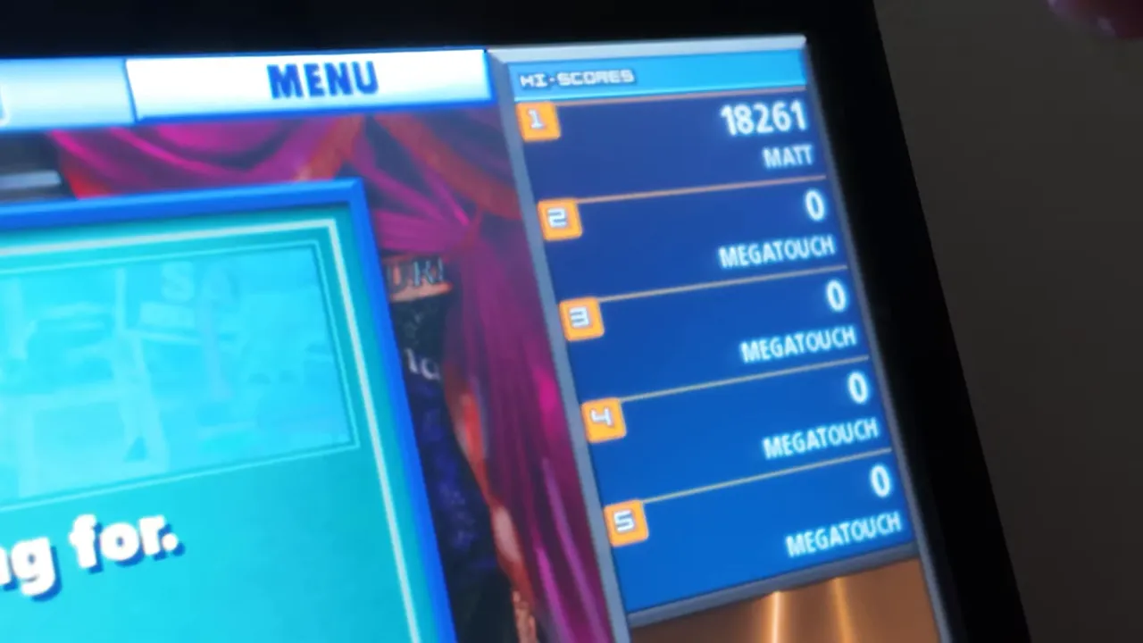 Menu MegaTouch affichant les hi-scores et la liste de scores