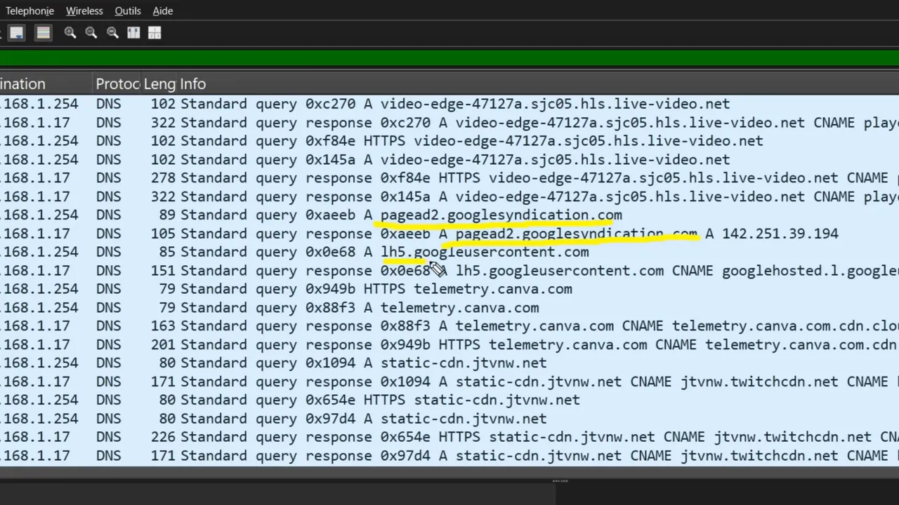 Capture Wireshark agrandie affichant des requêtes DNS lisibles, y compris pagead2.googlesyndication.com.