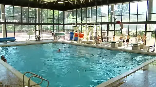 Competition pool and dive well in the aquatics area