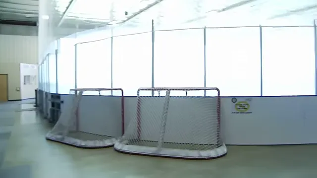 Ice rink with skaters and rental skates