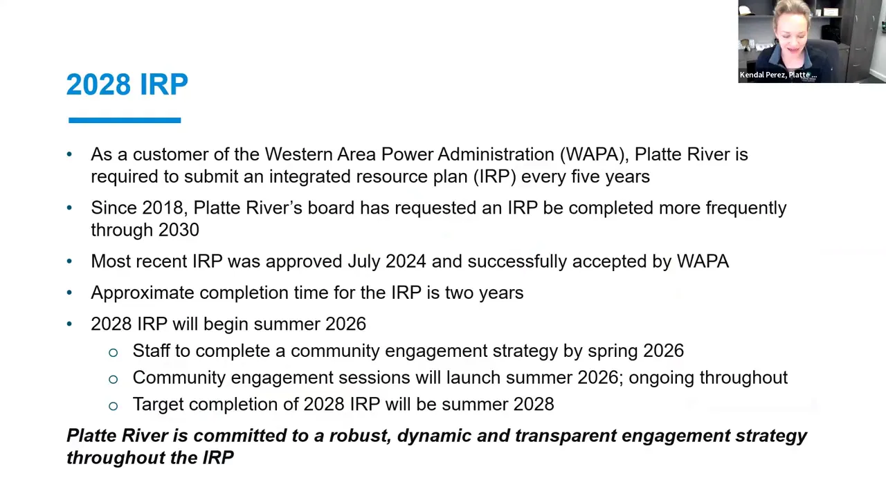 Presentation slide titled '2028 IRP' with bullet points describing IRP timing, recent approval, and community engagement milestones; small presenter thumbnail in the corner.