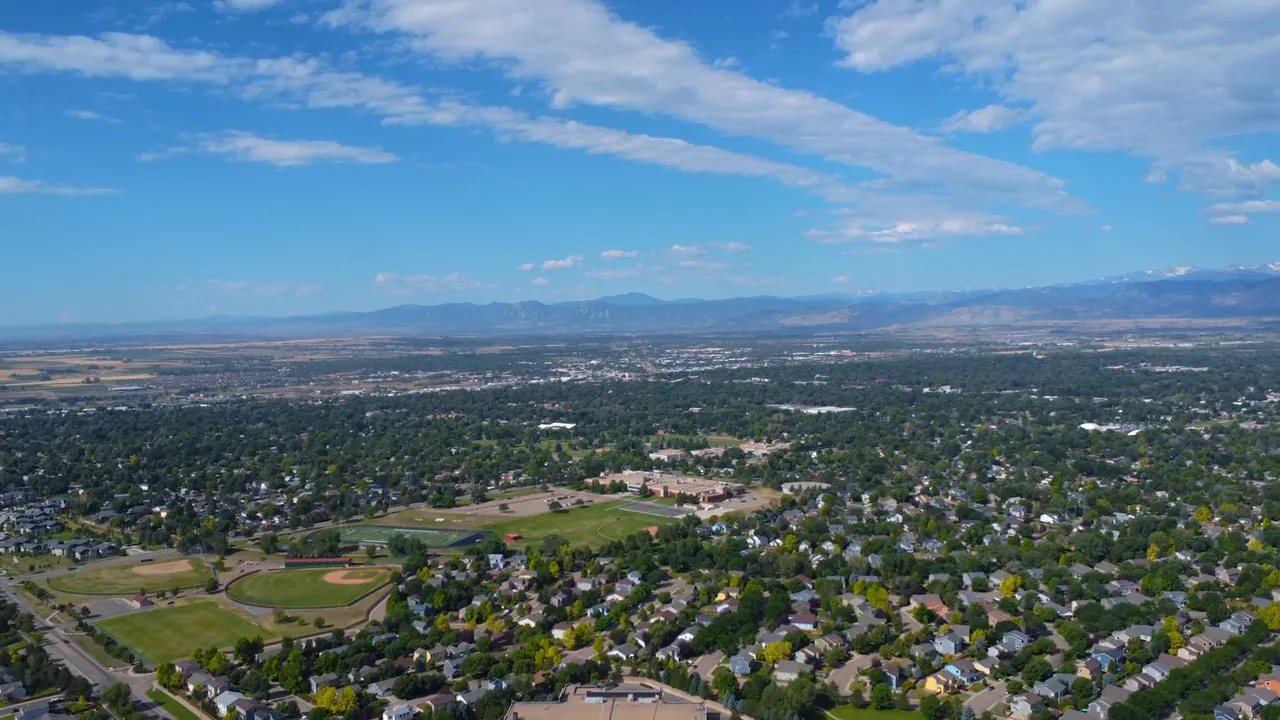 Map display showing Longmont and Boulder with travel time