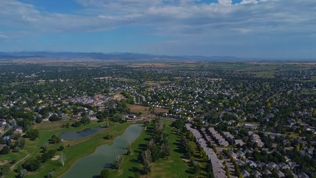 Neighborhood street in Longmont with newer homes