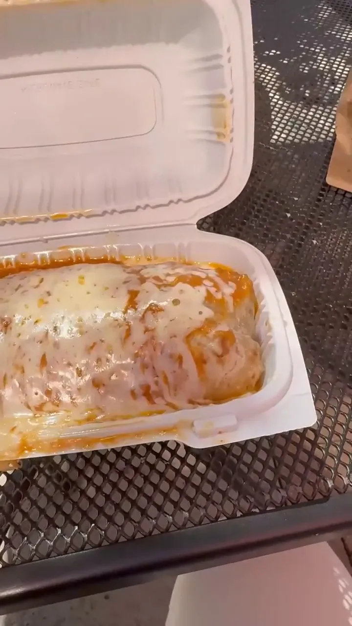 Packed Super Wet Burrito ready to be enjoyed