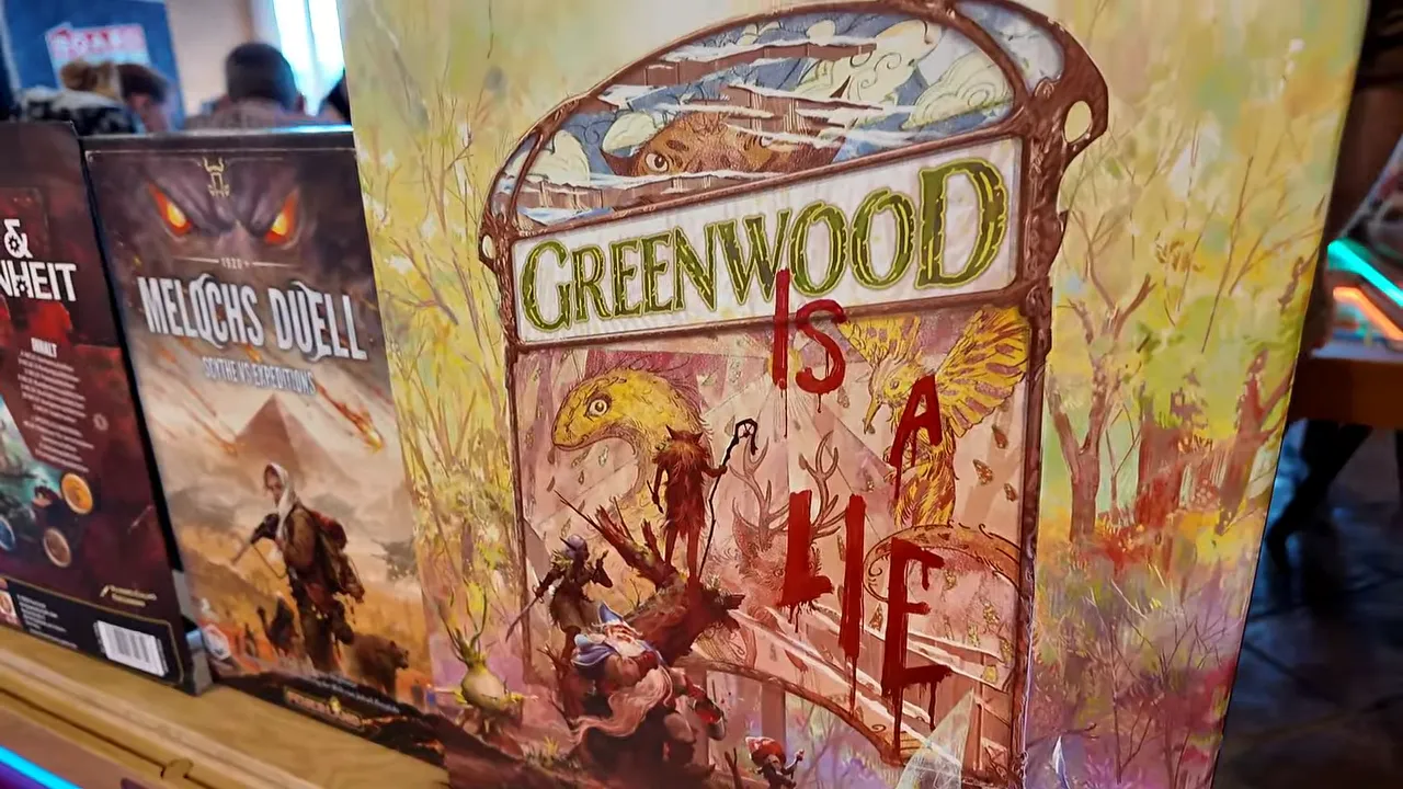 Große Greenwood Spielschachtel mit der Aufschrift Greenwood is a Lie neben weiteren Feuerland Neuheiten