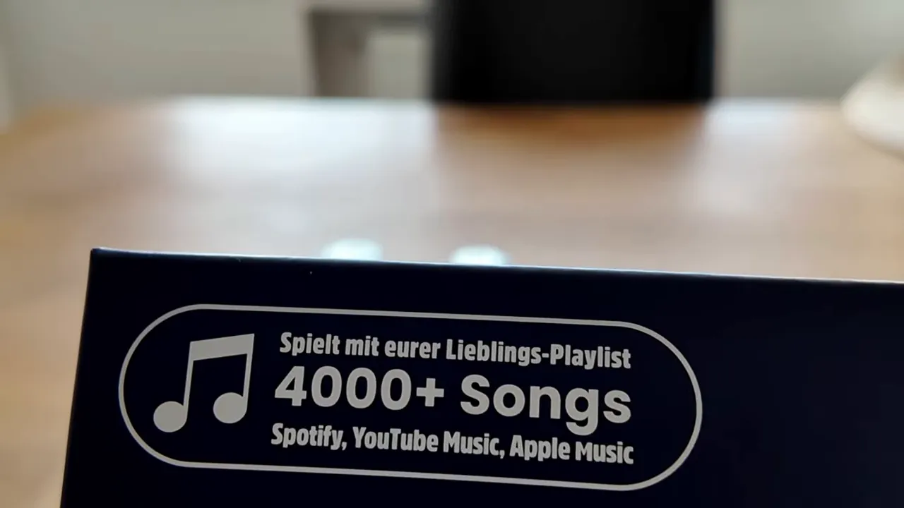 Karte mit dem Aufdruck 4000+ Songs und den Streamingdiensten Spotify YouTube Music und Apple Music