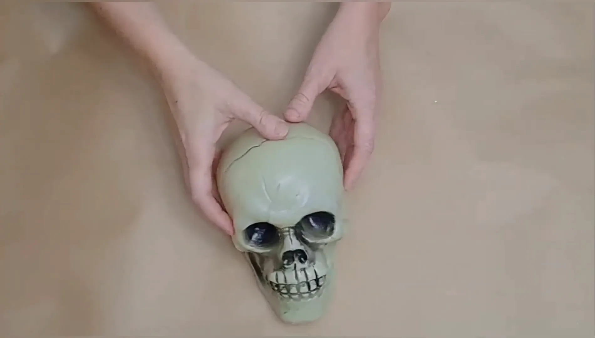 Cutting the top off the skull.