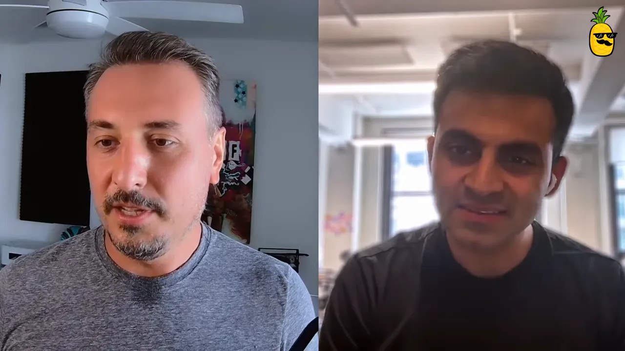 Two people in a split‑screen video interview, host and guest speaking in a home/office setting