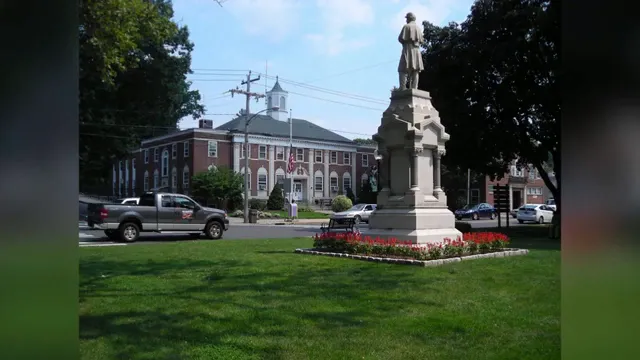 Southington town green with grass, shade trees, and Town Hall in the background