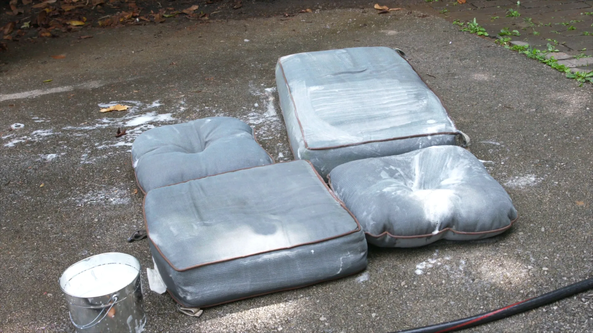 Cleaning solution sitting on outdoor cushions