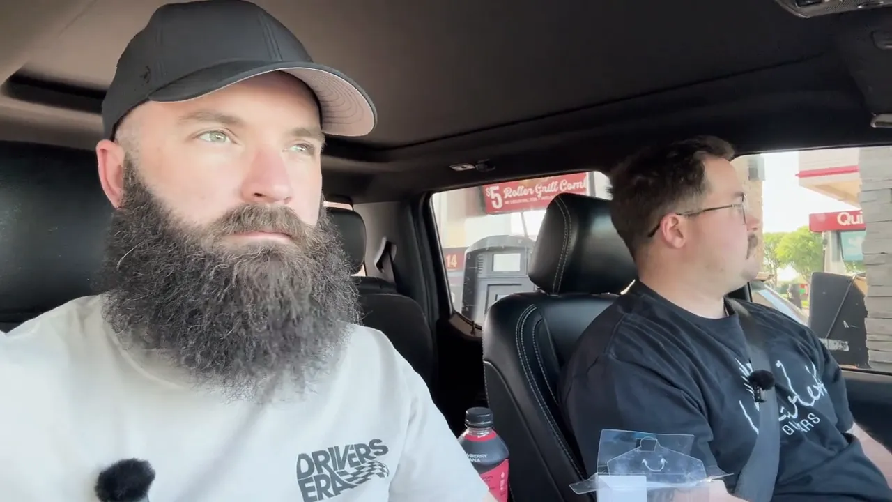 Builder and teammate riding in a car while traveling to the Dallas guitar festival with guitars