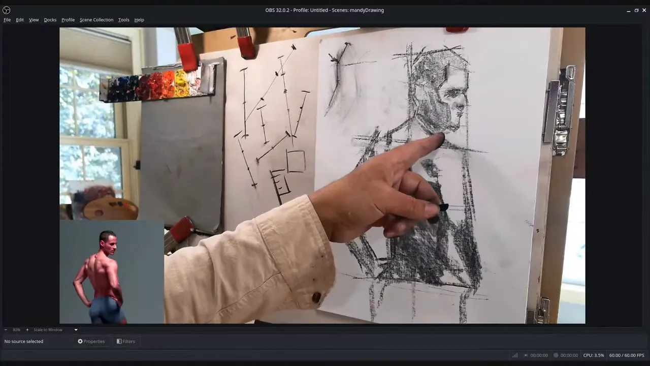 Instructor pointing to alignment lines on a charcoal figure drawing to demonstrate triangulation