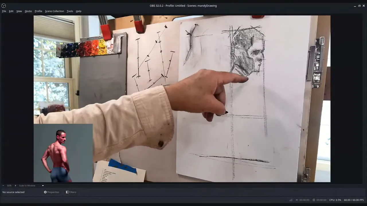 Artist pointing at a vertical plumb line and horizontal alignment marks on a charcoal figure drawing