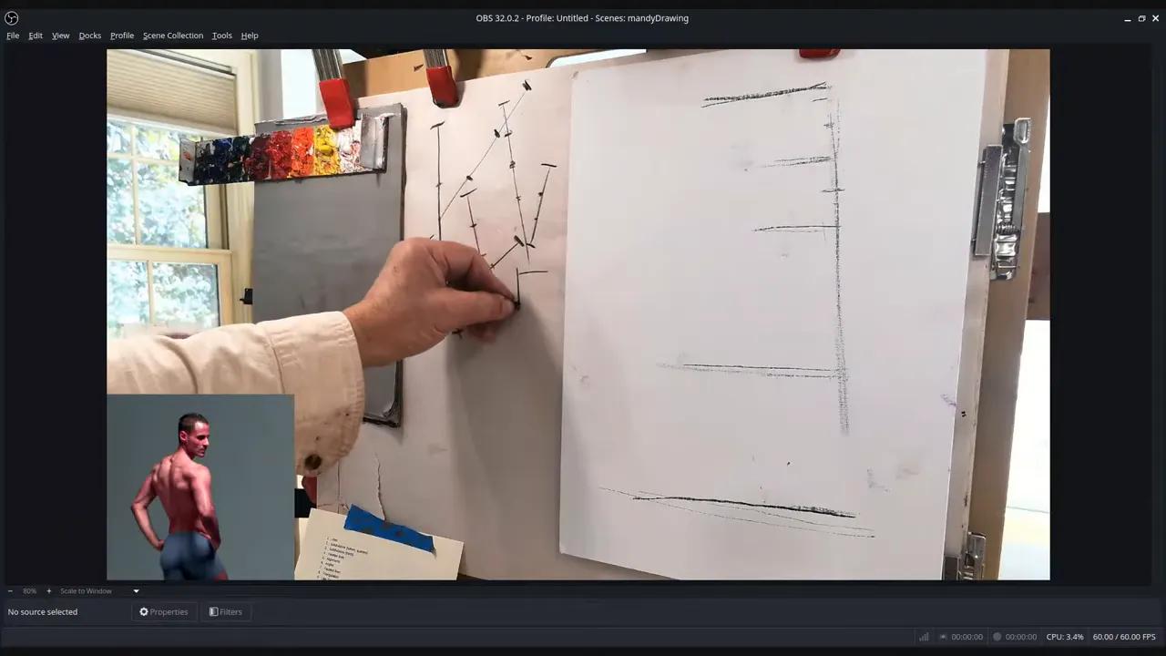 Hand adding tick marks to a faceted-line diagram on a drawing board, showing cubes and angle measurements.