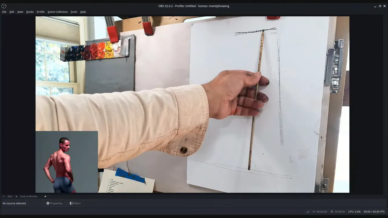 artist holding a thin measuring stick perpendicular to paper with arm fully extended