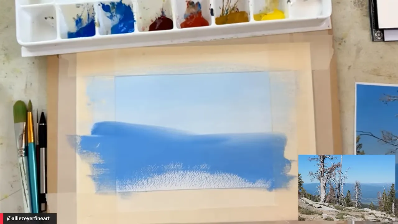 Gouache landscape block-in with blue sky and distant mountain shapes