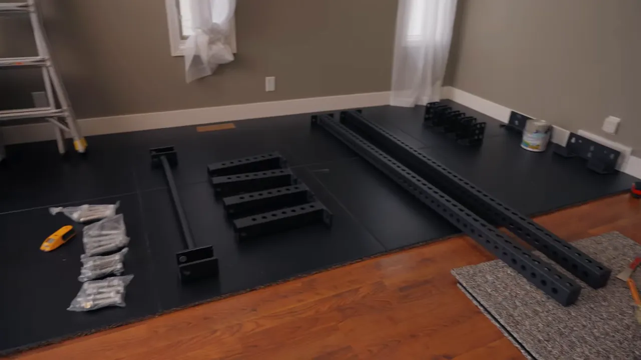 Boxes and parts organized on the floor in front of the installation area