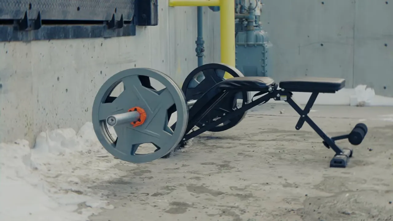 Severely damaged adjustable utility bench frame after impact test