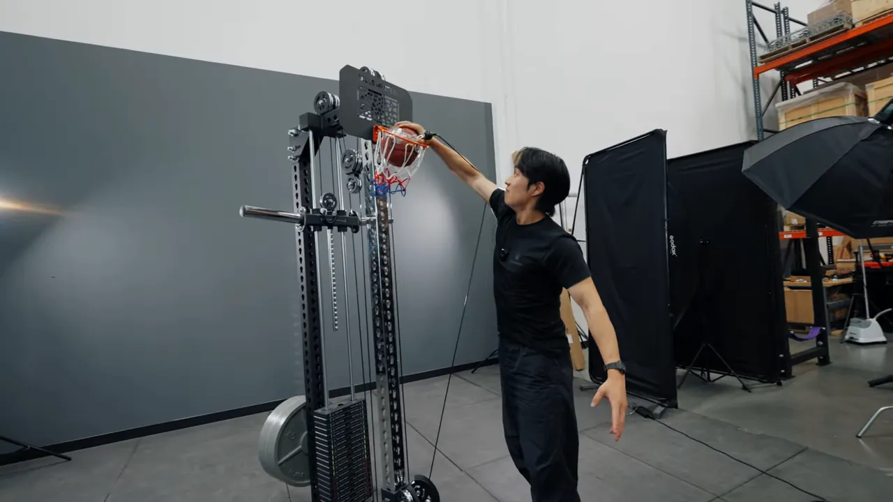 Basketball attachment used with packaging tape for dunk practice