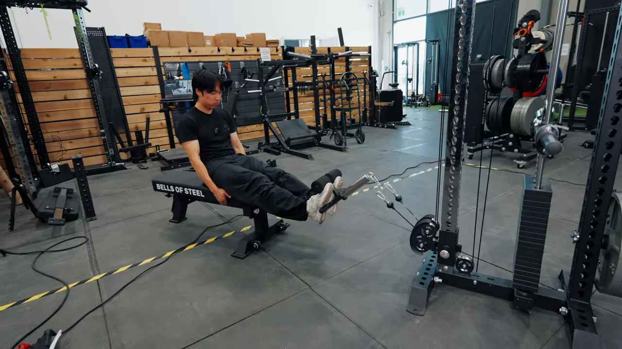 Tip bar attachment used for tibialis anterior raises while seated on a bench