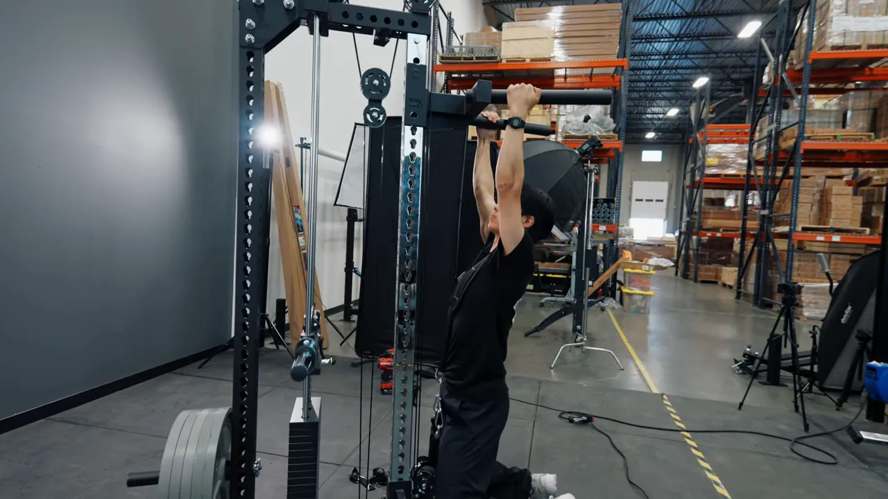 Y dip attachment set higher on the tower for weighted pull ups
