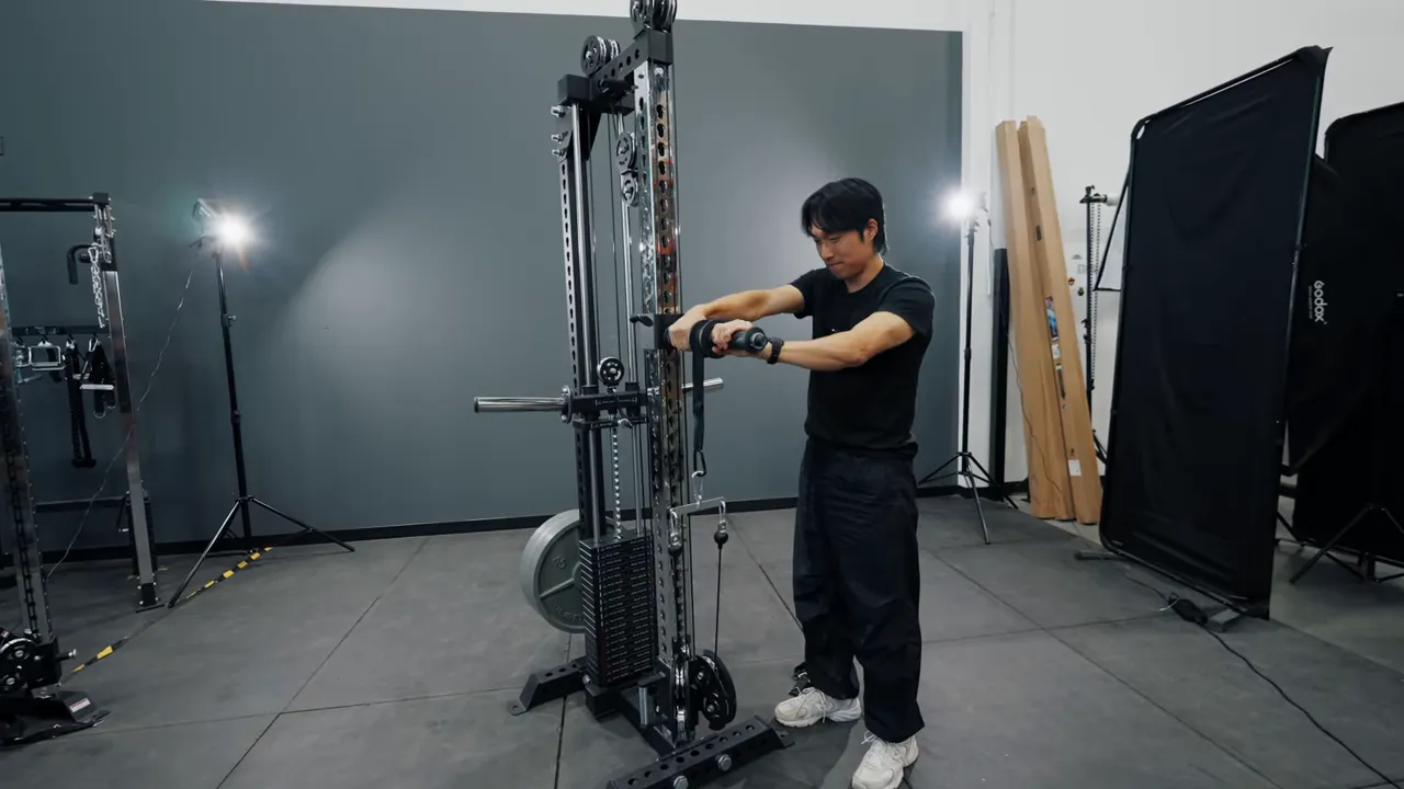 Wrist roller attached to rack for forearm training