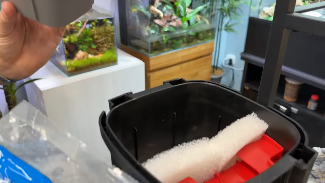Hang-on-back filter with media basket and filter sponge visible