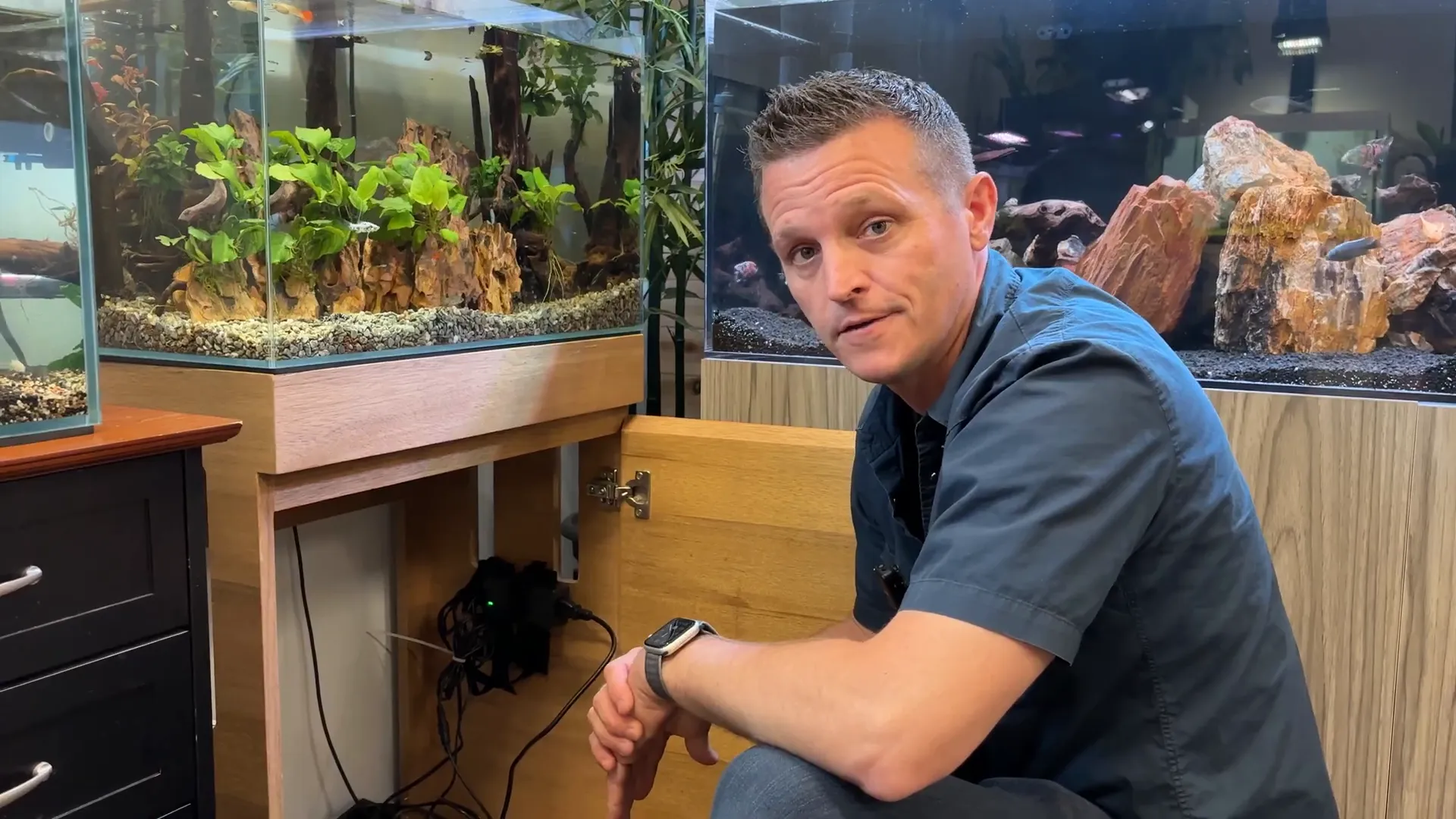 Electrical drip loops secured under aquarium