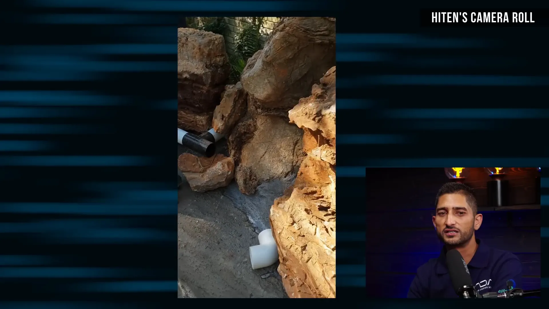 Large garden pond with waterfall and aquatic plants