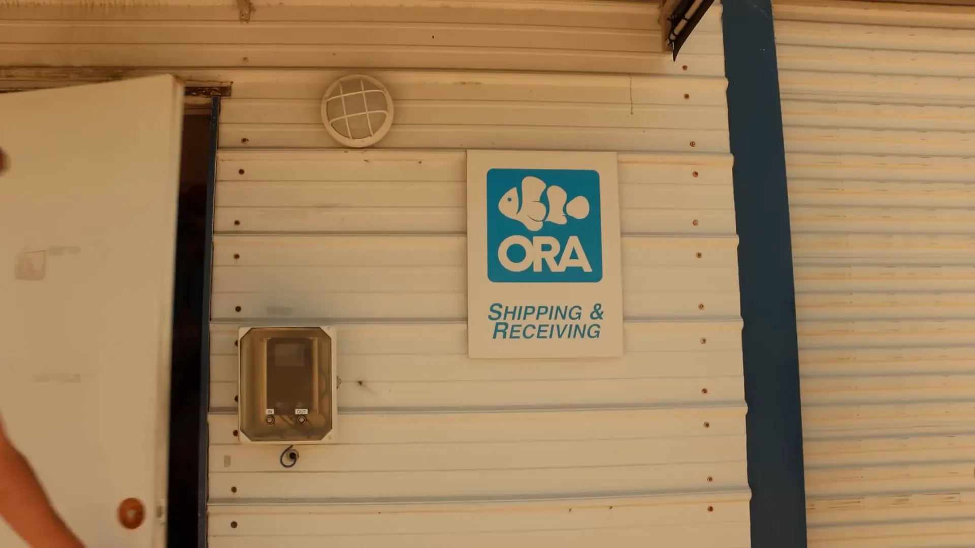 Overview of ORA coral greenhouse bathed in sunlight