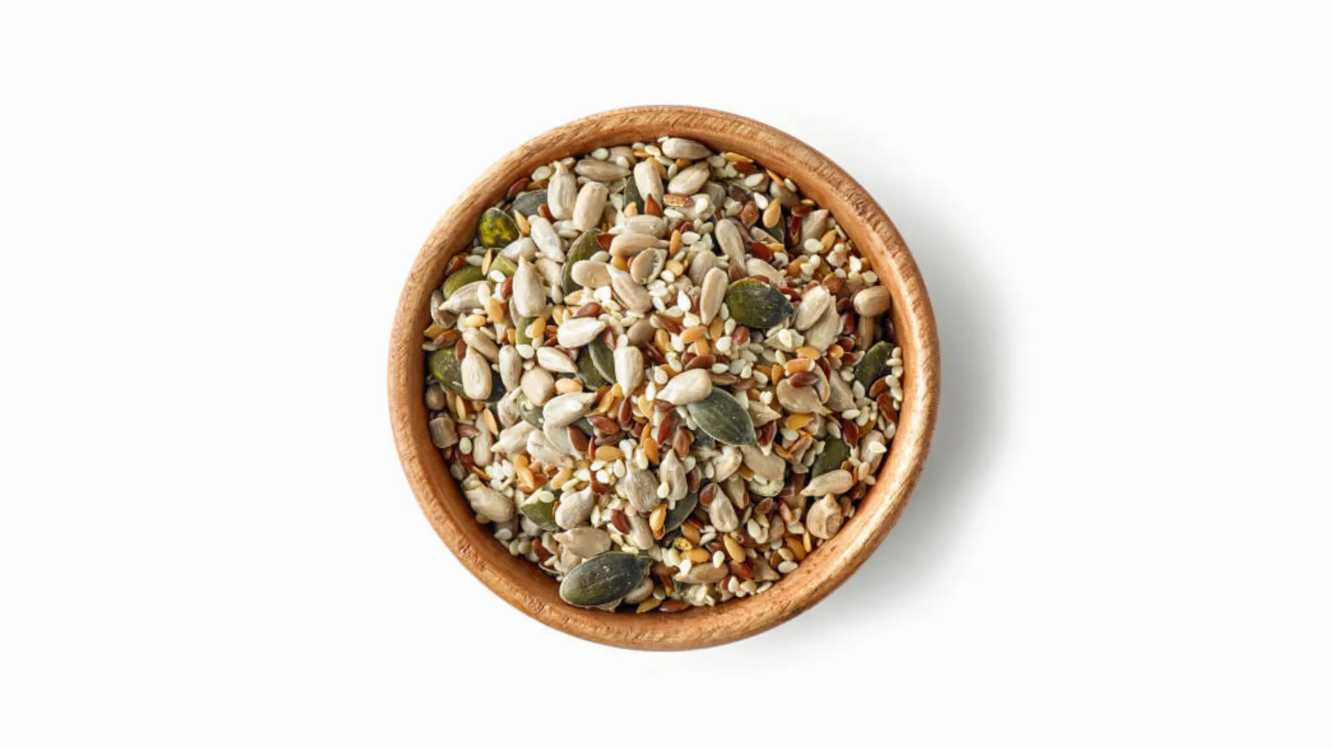 Close-up of sunflower seeds and peanuts favored by Sun Conures