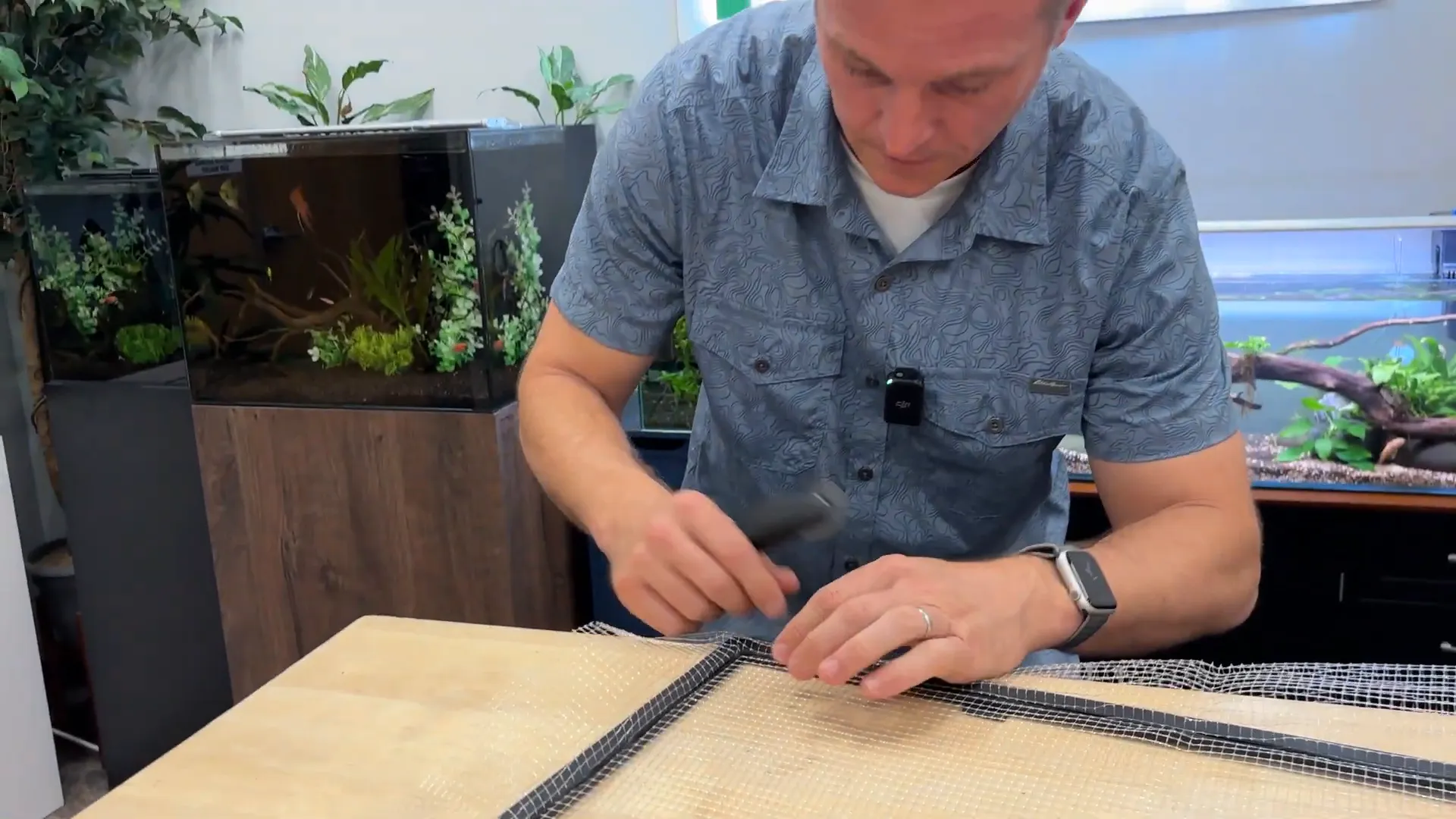 Installing the screen into the frame groove with the roller tool