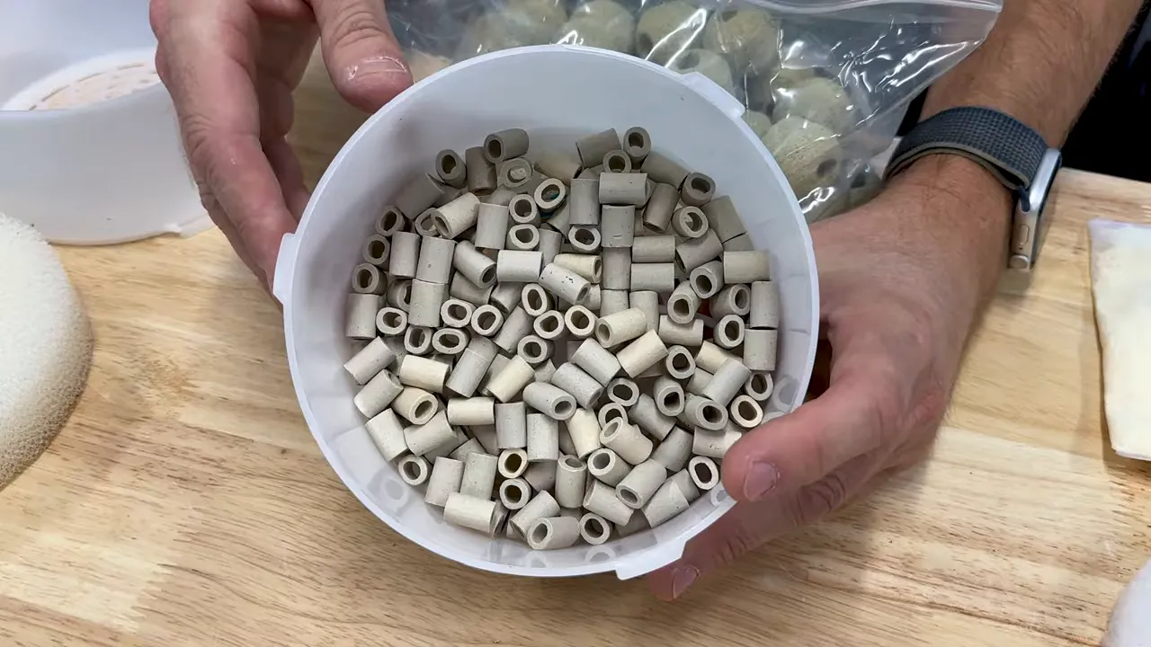 Bowl filled with cylindrical ceramic biological filter media