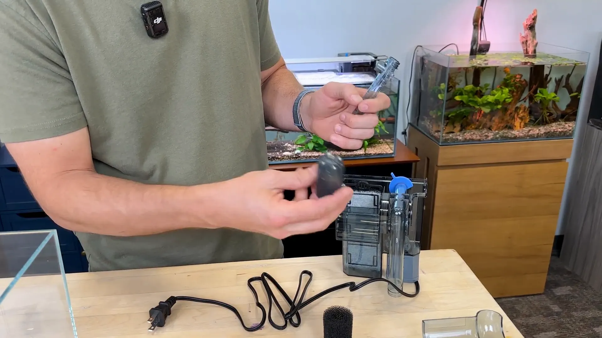 Filter assembly with filtration pads and motor