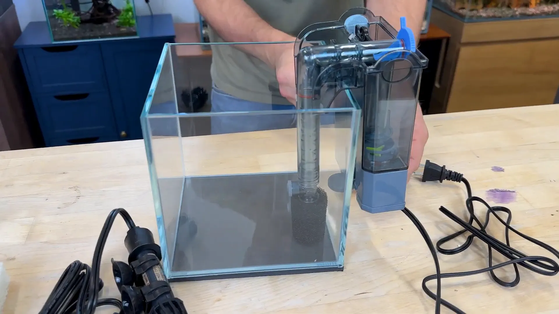 Filter attached to tank and positioned evenly