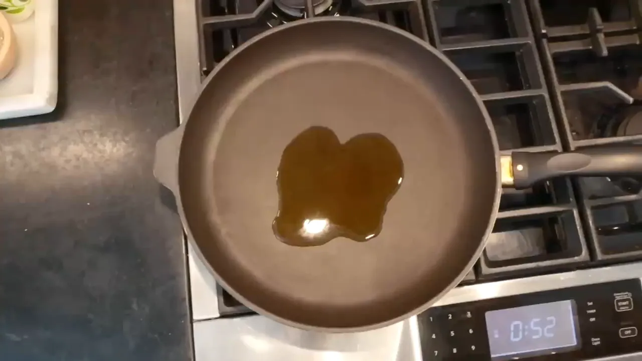 Heating olive oil in a skillet