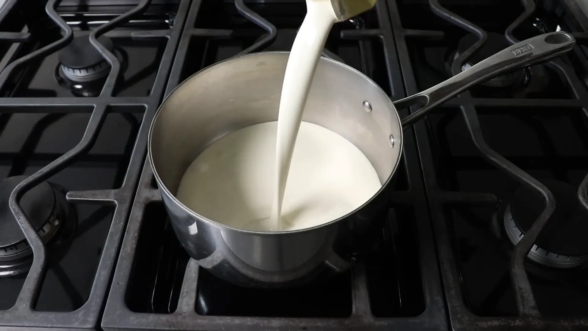 Heating cream in saucepan