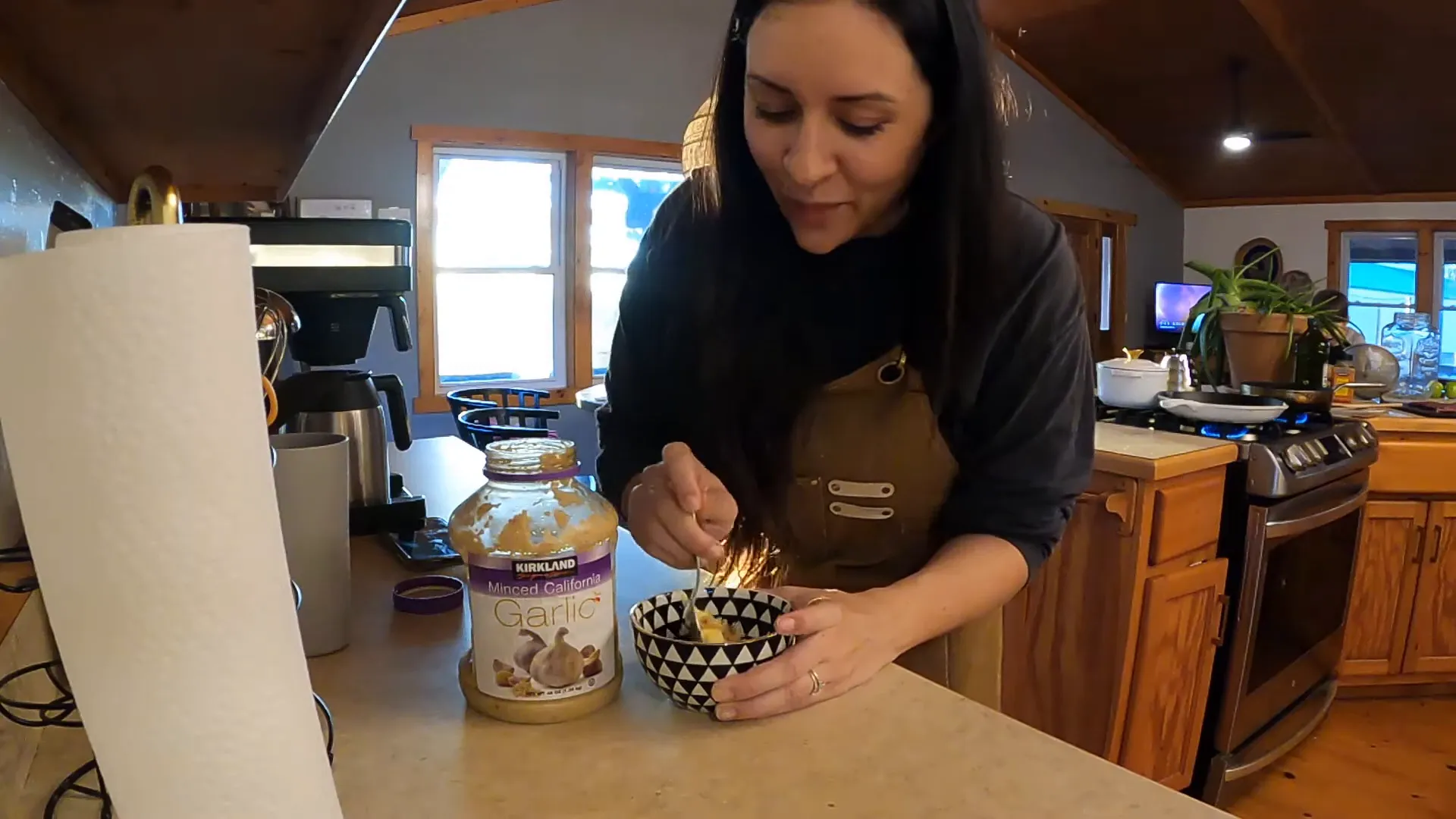 Preparing garlic butter for the steak.