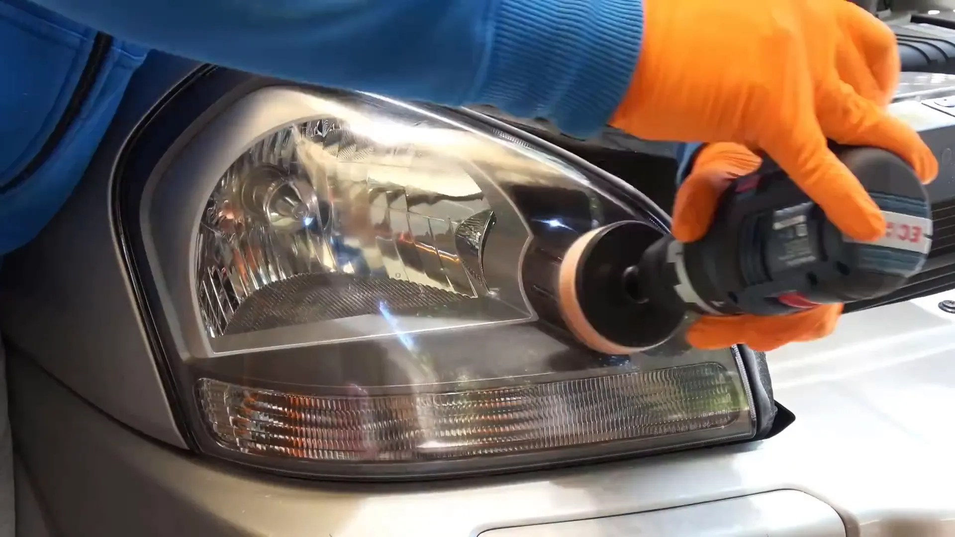 Polishing headlights with a drill