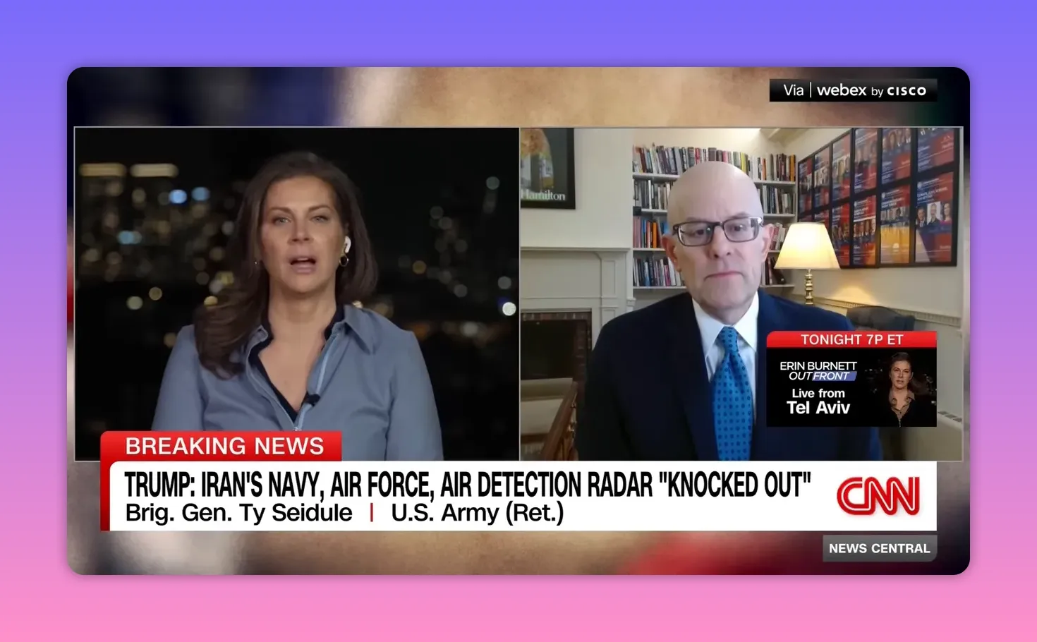 Klares Fernseh‑Standbild: Zwei Interviewpartner im Splitscreen, 'Breaking News' Banner sichtbar