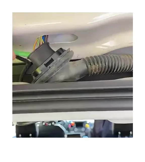 Fish tool running wire through grommet of Ford Expedition rear hatch
